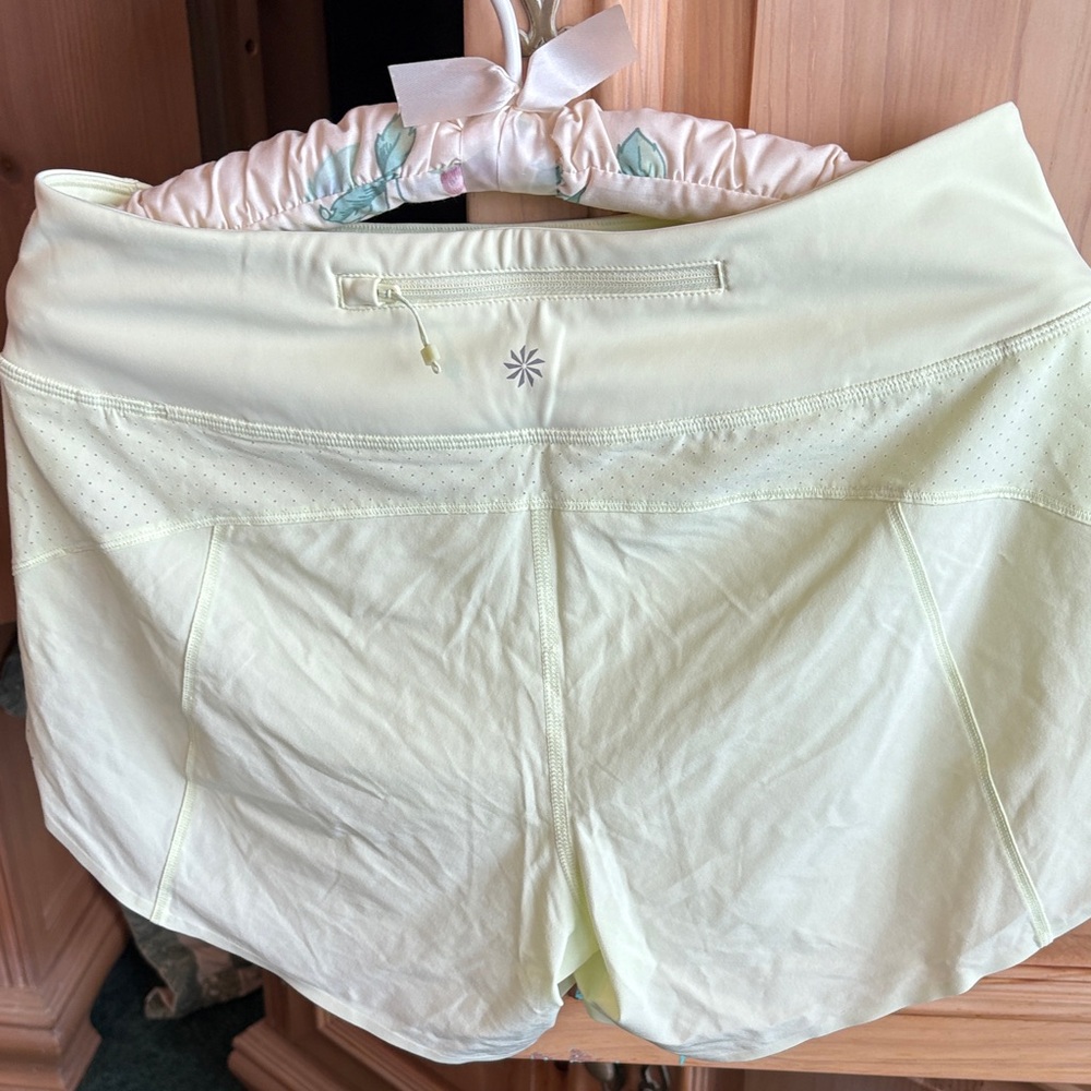 Athleta Light Yellow Athletic Shorts